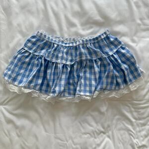 Blue and white gingham mini skirt with lace trim